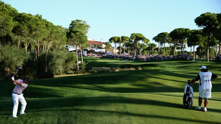 Victor Dubuisson of France plays his second shot on the 18th green during the final round of the 2013 Turkish Airlines Open