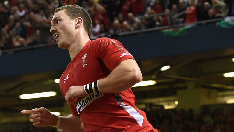 Wales' George North celebrates scoring the opening try during the Dove Men Series match at the Millennium Stadium, Cardiff.