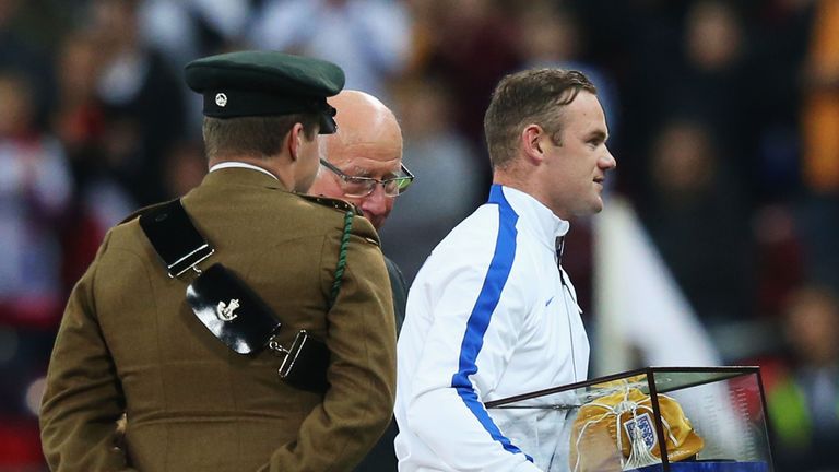 Wayne Rooney collects his 100th cap ahead of the clash with Slovenia