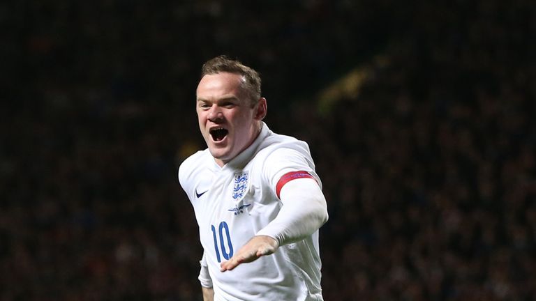 England's striker Wayne Rooney celebrates scoring their second goal during the international friendly match between Scotland and England at Celtic Park