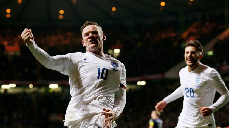 Wayne Rooney of England celebrates after scoring his team's third goal during the International Friendly match between Scotland and England at Parkhead