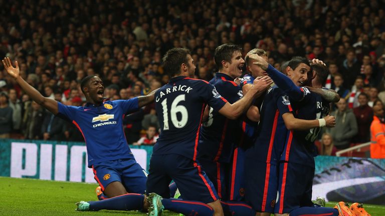 Wayne Rooney: Celebrates his goal for United at Arsenal
