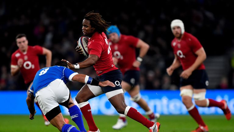 LONDON, ENGLAND - NOVEMBER 22:  Marland Yarde of England is challenged by Kahn Fotuali'i of Samoa during the QBE international match between England and Sa