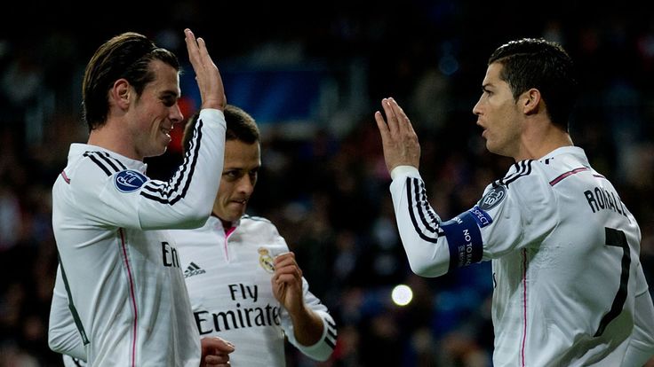 Cristiano Ronaldo (R) of Real Madrid CF celebrates scoring their opening goal with teammate Gareth Bale