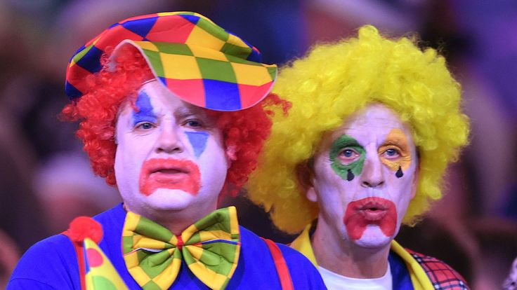 Darts fans in fancy dress during the William Hill World Darts Championship at Alexandra Palace, London.