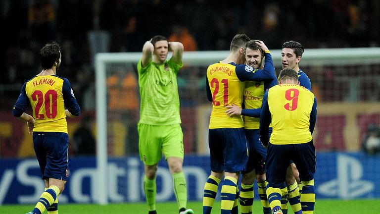 Arsenal's Aaron  Ramsey (3rdR) celebrates with teammates after scoring a goal against Galatasaray 