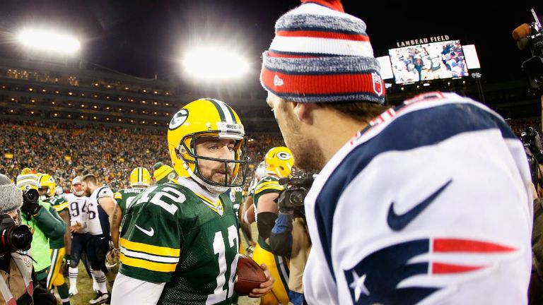 Quarterbacks Aaron Rodgers of the Green Bay Packers and Tom Brady of the New England Patriots