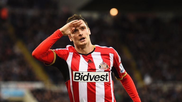 Adam Johnson of Sunderland celebrates scoring the opening goal during the Barclays Premier League match at Newcastle