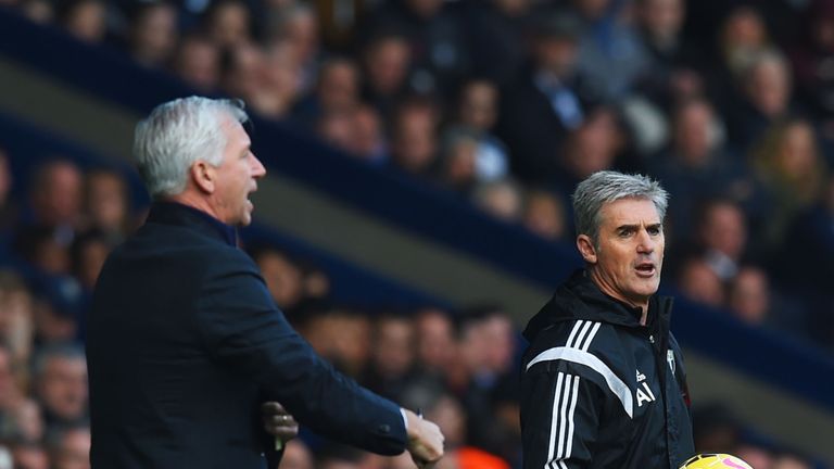 WEST BROMWICH, ENGLAND - NOVEMBER 09:  Alan Pardew manager of Newcastle United (L) and Alan Irvine manager of West Bromwich Albion