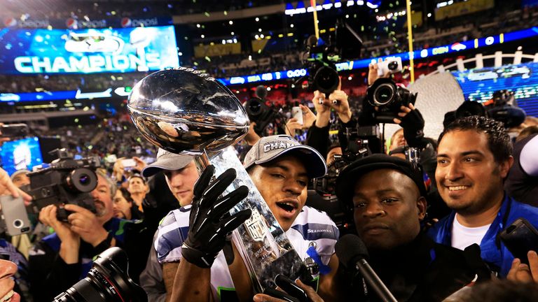 Defensive back DeShawn Shead #35 of the Seattle Seahawks celebrates holding the Vince Lombardi Trophy