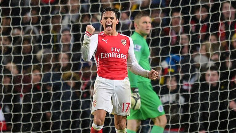 Arsenal's Alexis Sanchez celebrates scoring his side's first goal during the Barclays Premier League match at the Emirates Stadium, London.