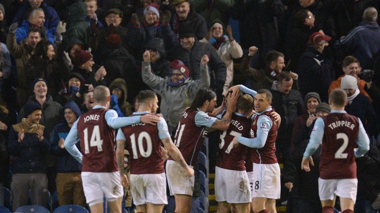 Ashley Barnes of Burnley celebrates with team-mates after scoring the winning goal