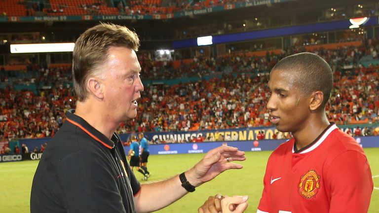 Manager Louis van Gaal of Manchester United congratulates Ashley Young after a pre-season friendly in Miami in the summer of 2014