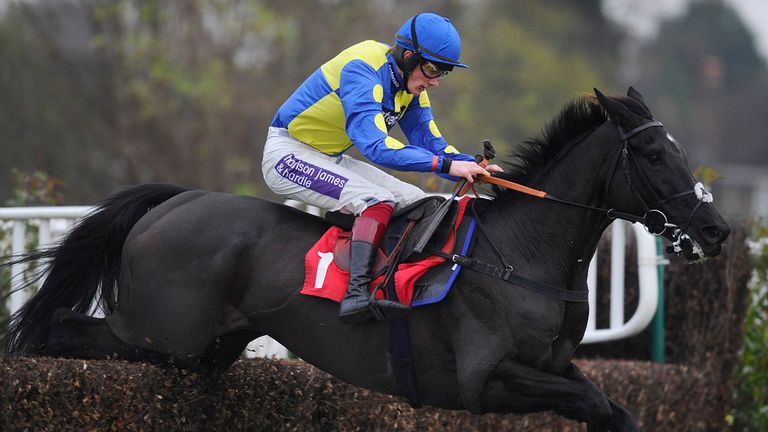 ESHER, ENGLAND - DECEMBER 05:  Sam Twiston-Davies and Black Thunder clear the last to win The John Tyndall Memorial Future Stars Steeple Chase at Sandown.