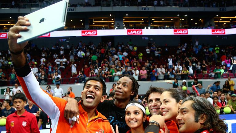 Rohan Bopanna of the Indian Aces takes a team selfie after their victory against the Manila Mavericks