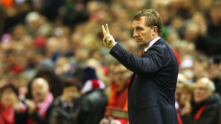 Brendan Rodgers, manager of Liverpool signals during the Barclays Premier League match between Liverpool and Arsenal at Anfield