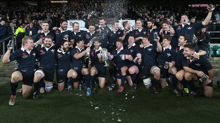 LONDON, ENGLAND - DECEMBER 11:  Oxford celebrate after their victory during the Varsity match between Oxford University and Cambridge University at Twicken