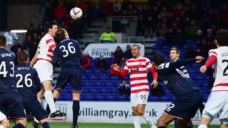 Former Ross County player Martin Canning (5) heads heads Hamilton into the lead. 