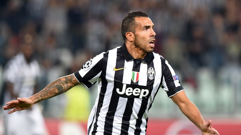 Carlos Tevez of Juventus celebrates the opening goal during the UEFA Champions League Group A match between Juventus and Malmo