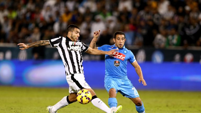 Carlos Tevez of Juventus in action during the 2014 Italian Super Cup match v Napoli at the Jassim Bin Hamad Stadium in Doha