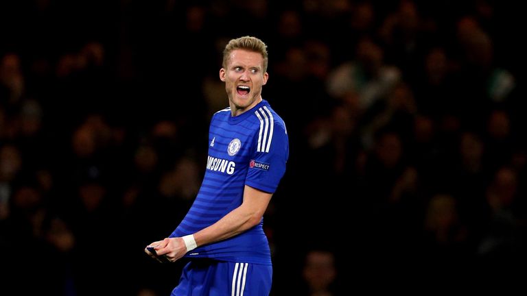 Andre Schurrle of Chelsea celebrates after scoring his team's second goal during the Champions League match v Sporting Lisbon