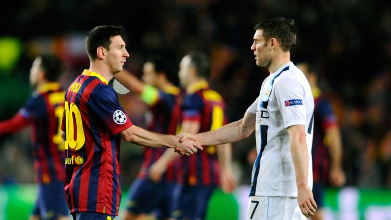 Lionel Messi of Barcelona shakes hands with a dejected James Milner 
