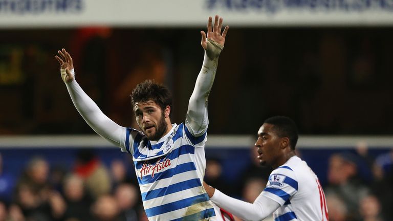 Charlie Austin of QPR celebrates his third goal during the Barclays Premier League match between Queens Park Rangers and West Brom