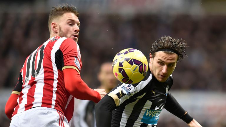 Connor Wickham and Daryl Janmaat tangle
