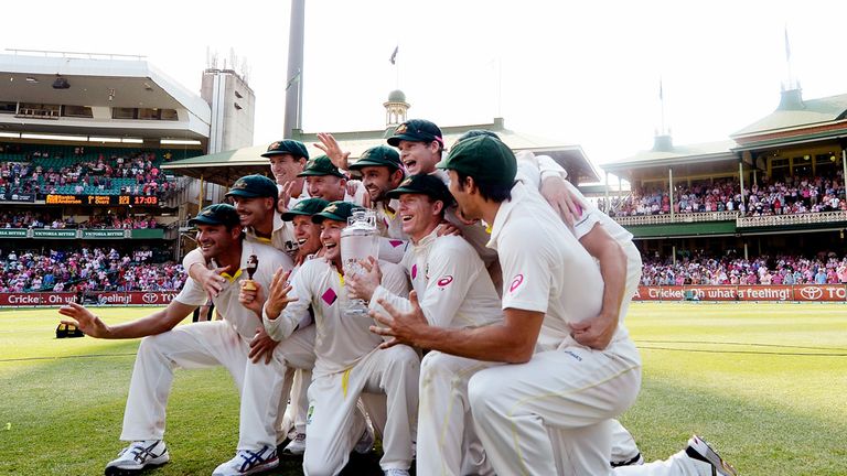 The Australian team celebrates with the urn after winning the Ashes series 5-0 during day three of the Fifth Ashes Test