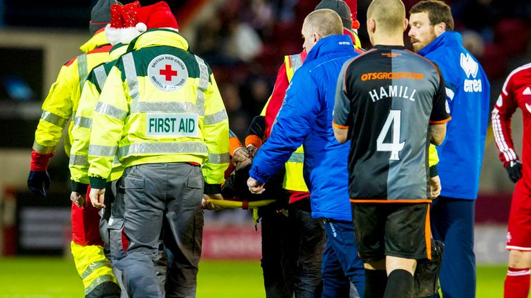 Darryl Westlake is carried off at Pittodrie on Saturday