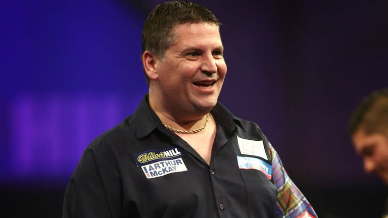 Gary Anderson celebrates winning a leg during his second round match against Jelle Klaasen