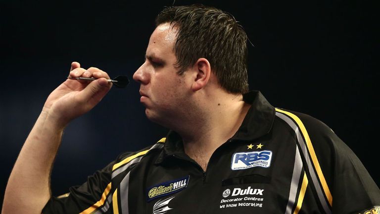 Adrian Lewis in action during his second round match against Keegan Brown at the PDC World Darts 