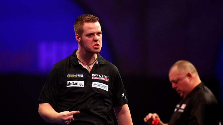 Germany's Max Hopp reaches round two with a victory over struggling Mervyn King.