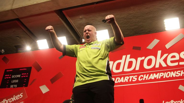 Michael van Gerwen celebrates victory over Adrian Lewis 2013 World Darts Championship quarter-final