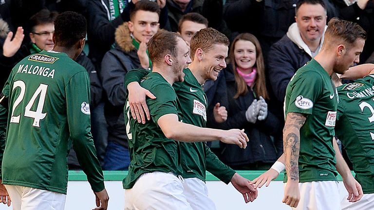 Hibernian defender David Gray (2nd left) celebrates his opener against Rangers with his team-mates