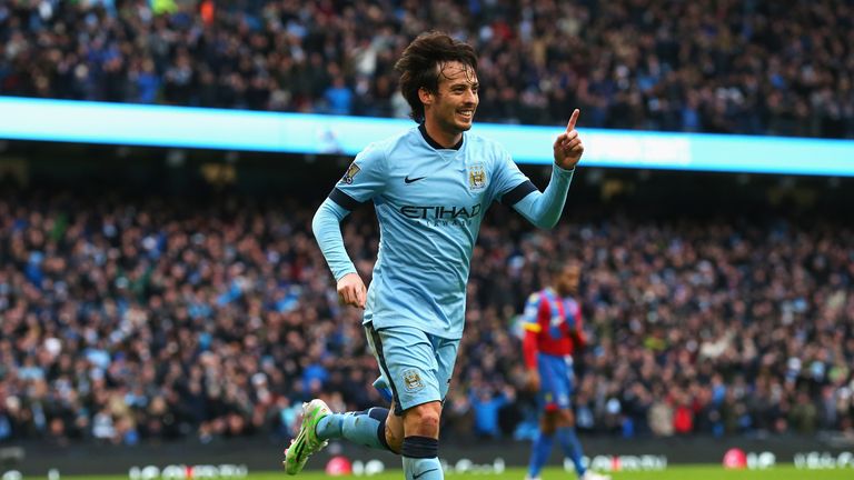 MANCHESTER, ENGLAND - DECEMBER 20:  David Silva of Manchester City celebrates scoring his team's second goal during the Barclays Premier League match betwe