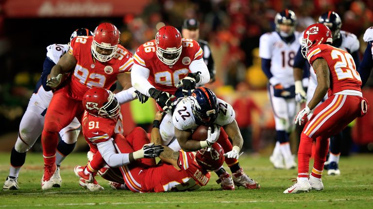 KANSAS CITY, MO - NOVEMBER 30: C.J. Anderson #22 of the Denver Broncos carries the ball against the Kansas City Chiefs during the game at Arrowhead Stadium