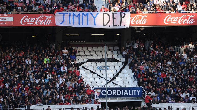 A picture taken on November 30, 2014 shows a tribute to a football fan who died following clashes near Atletico Madrid's Vicente Calderon stadium, before t