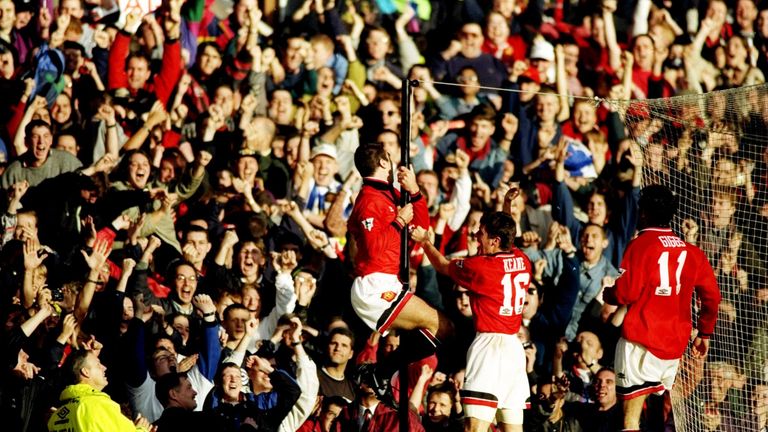 Eric Cantona of Manchester United celebrates during an FA Carling Premiership match against Liverpool at Old Trafford