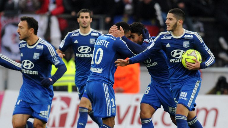 Yassine Benzia celebrates after netting an equaliser for Lyon