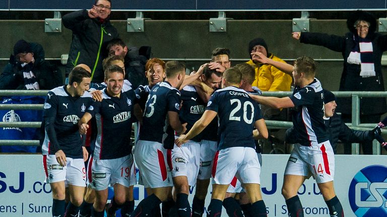 Falkirk's David McCracken is congratulated after scoring the winner late on in the match.