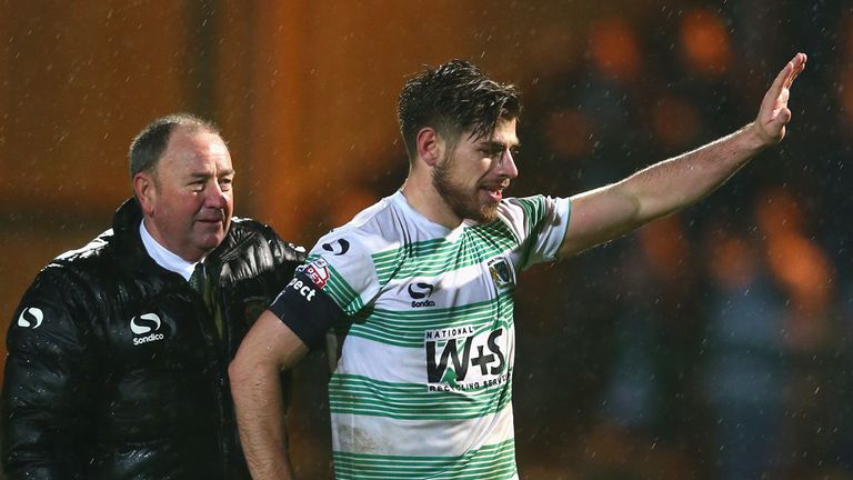 Gary Johnson (L) the manager of Yeovil alongside captain Joseph Edwards (R) after their sides 2-0 victory
