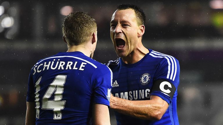 Andre Schurrle of Chelsea celebrates his goal with John Terry of Chelsea during the Capital One Cup Quarter-Final match