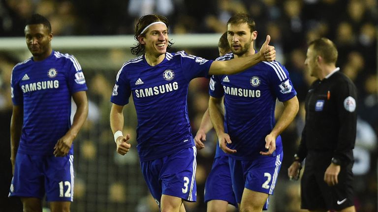 Filipe Luis of Chelsea celebrates scoring his team's second goal during the Capital One Cup Quarter-Final match