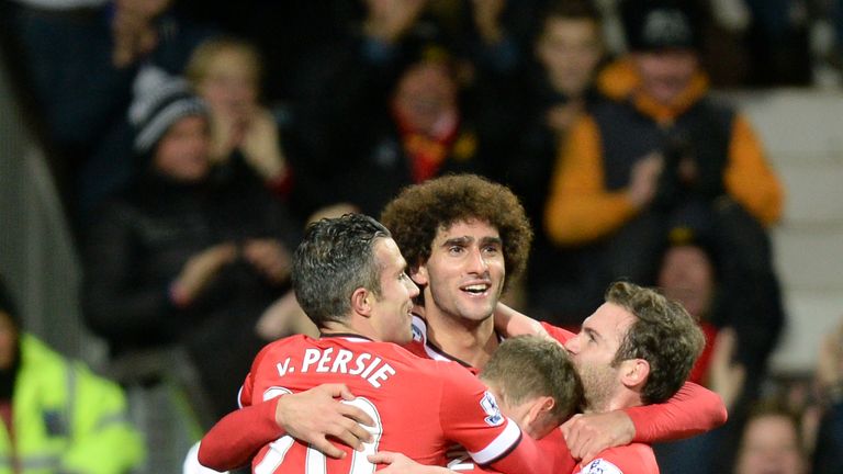 Manchester United's Marouane Fellaini celebrates scoring his team's first goal against Stoke at Old Trafford