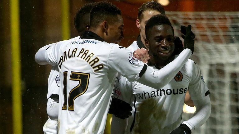  Wolves celebrate with Nouha Dicko after he scores to make it 1-0 during the Sky Bet Championship match at Watford