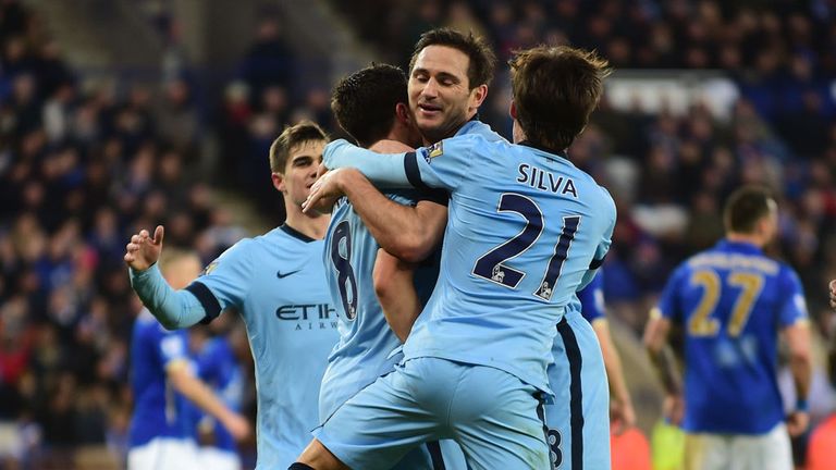 Manchester City midfielder Frank Lampard is congratulated