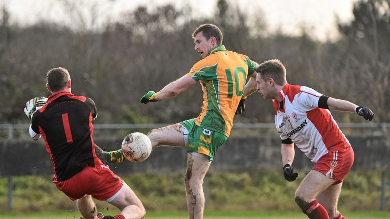Tir Chonaill Gaels goalkeeper Declan Traynor denies Gary Sice during the first half at Ruislip