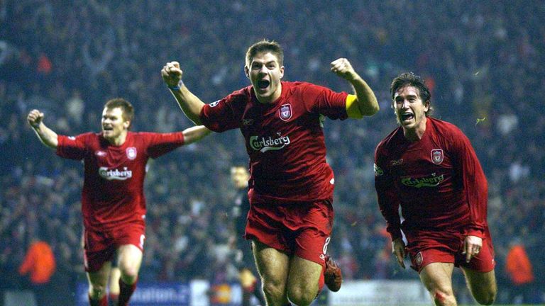 LIVERPOOL, UNITED KINGDOM:  Liverpool's Steven Gerard (c) flanked by John Arne Riise (l) and Harry Kew ll (r) celebrates scoring to make it 3-1 against Oly