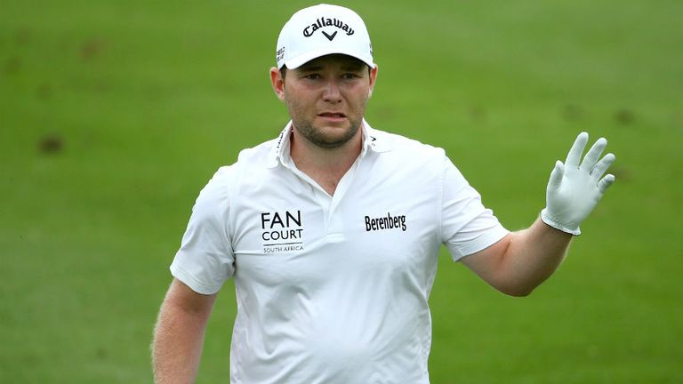 Branden Grace of South Africa plays into the 14th green during the third round of the Alfred Dunhill Championship at Leopard Creek Country Golf Club